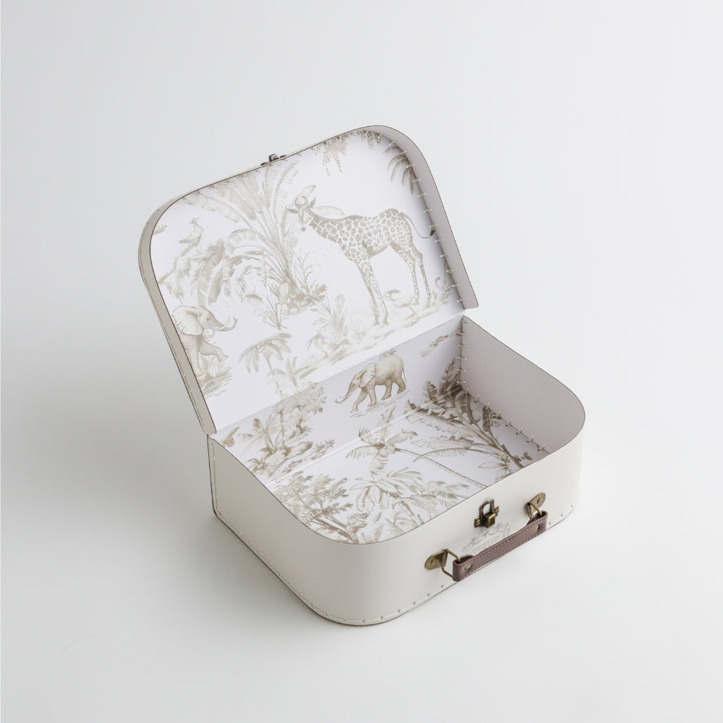 An elegant white vintage memory suitcase with a safari-themed interior, featuring illustrations of giraffes, elephants, and jungle foliage.