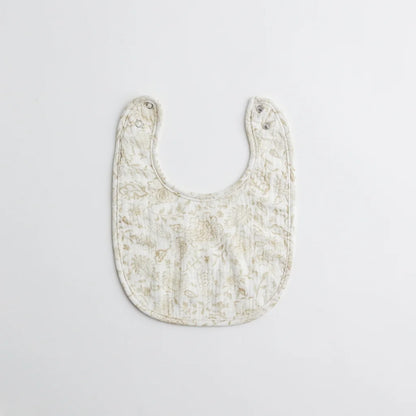 A beautifully patterned baby bib with intricate golden floral motifs. The soft, breathable fabric ensures a comfortable fit for little ones.